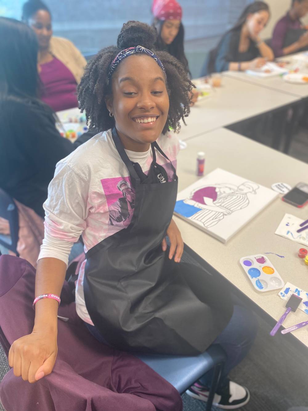 NIARA mentee enjoying the program and painting